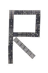 letter R made of  black  dominoes tiles