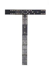 letter T made of  black  dominoes tiles