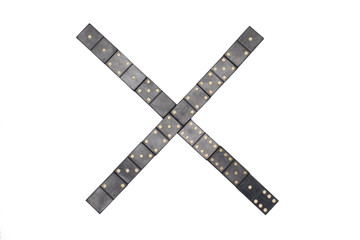 letter X made of  black  dominoes tiles