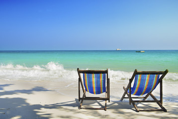 chair in sea sand sun