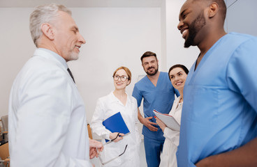 Joyful young interns graduating from the medical university