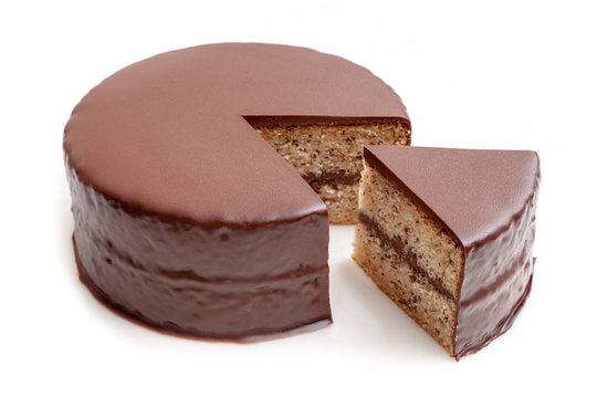 Sliced chocolate ganache cake pound on white background isolated