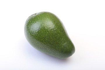 Fresh, green Avocado isolated on a white background.