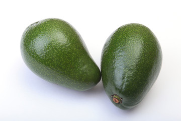 Fresh, green Avocado isolated on a white background.