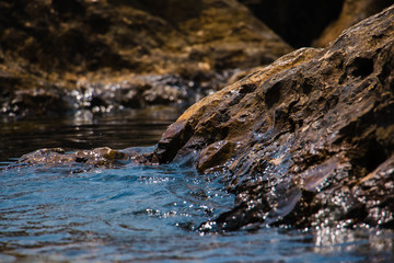 Beautiful seashore with breakwater and large stones