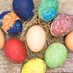 Easter eggs on wooden background 