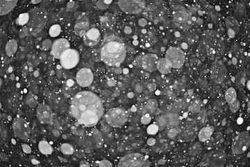 snow on a black background texture overlay bokeh highlights
