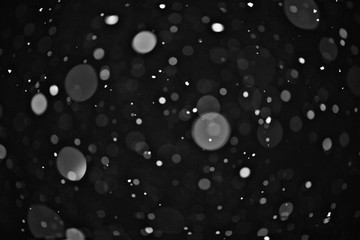 snow on a black background texture overlay bokeh highlights