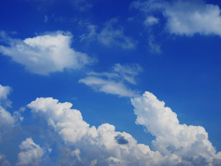 Naklejka na ściany i meble Blue sky and fluffy white cloud.