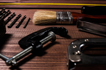 Set of hand tools on a wooden table