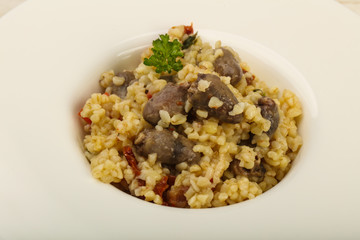 Bulgur with chicken hearts