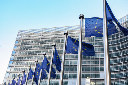 European flags on the background of the European Parliament