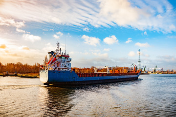 A cargo ship entering port of Gdansk, Poland.