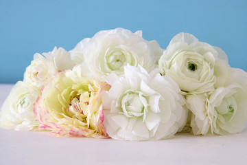 Bouquet of white rosses on wooden table