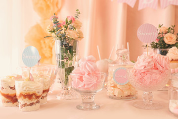 Candy bar. Table with different sweets for party