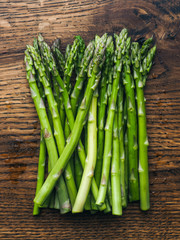 Fresh Asparagus on wood cutting board