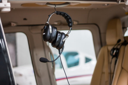 Headphones with a microphone in the helicopter cabin