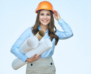 Smiling architect business woman with blueprints isolated portrait.