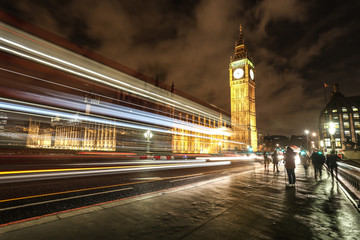 Fototapeta na wymiar Big Ben London Parliament building by night time with traffic
