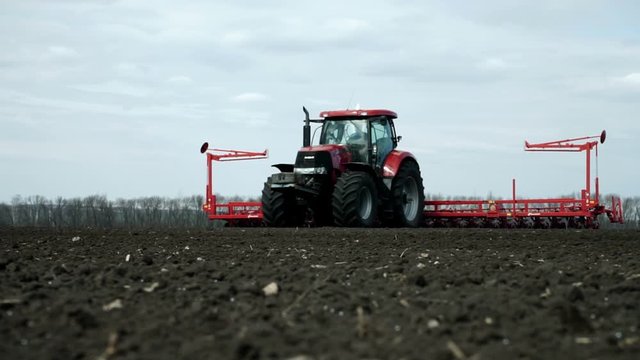 Spring sowing of sugar beet on a fertile land using modern agricultural machinery. HD