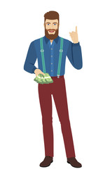 Hipster with cash money pointing up