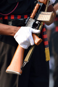 Indian army man is walking with gun