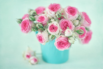 Close-up floral composition with a pink roses .Many beautiful fresh pink roses on a table. 