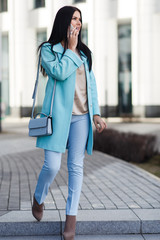 Fototapeta premium Portrait of brunette with phone