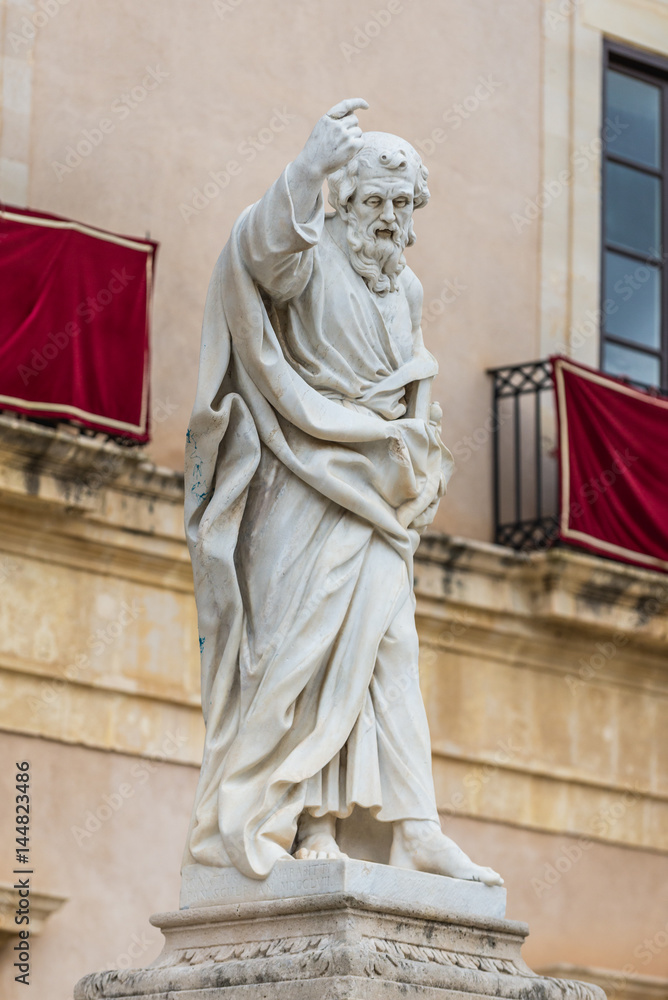 Poster Scultpure of Saint Paul in front of Syracuse Cathedral on Ortygia isle, Syracuse city, Sicily Island in Italy