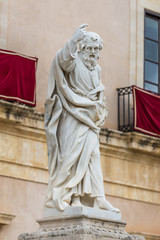 Scultpure of Saint Paul in front of Syracuse Cathedral on Ortygia isle, Syracuse city, Sicily Island in Italy