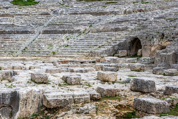 Cavea (ancient auditorium) of Greek theater in Neapolis Archaeological Park in Syracuse, Sicily Island of Italy