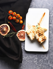 Tasty lavash or pita bread with fresh vegetables