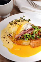 Toast with guacamole with egg Benedict