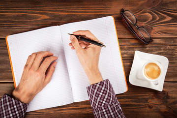 Copybook on a wooden table