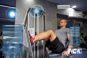 man flexing leg muscles on gym machine