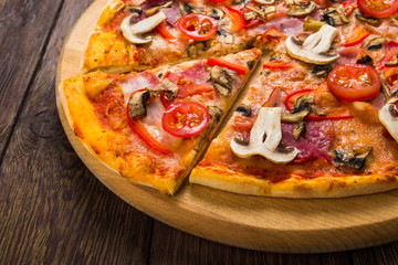 Delicious pizza with mushrooms and pepperoni