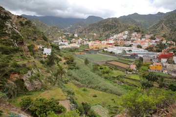 Fototapeta na wymiar VALLEHERMOSO, LA GOMERA, SPAIN: General view of the valley with terraced fields and mountains