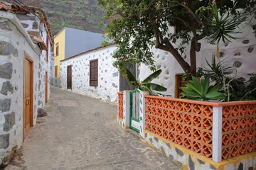 Foto op Canvas AGULO, LA GOMERA, SPAIN: Cobbled street with traditional houses © Christophe Cappelli