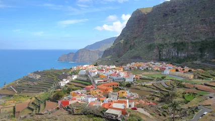 Poster AGULO, LA GOMERA, SPAIN: General view of the village with terraced fields and cliffs in the background © Christophe Cappelli