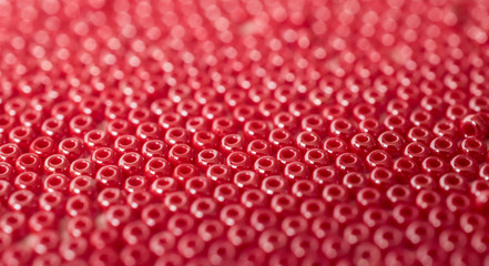 Heaps of red glass beads