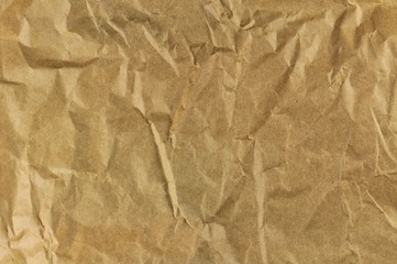 Crumple sepia paper for texture or background.