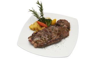 Isolated of sirloin steak with barbecue sauce.