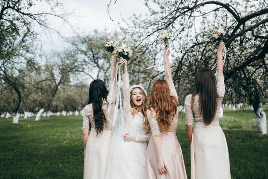 Beautiful bride with her pretty bridesmaids