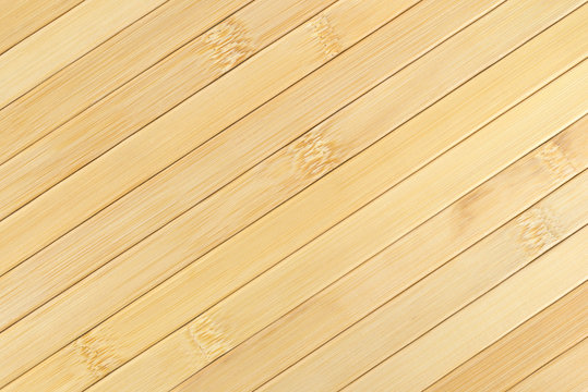 Wood place mat top at an angle.