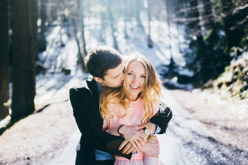 Happy couple in the forest