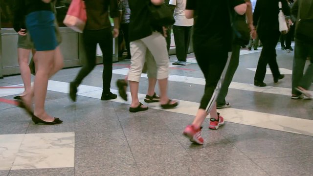Passengers getting off from a subway train in Singapore 