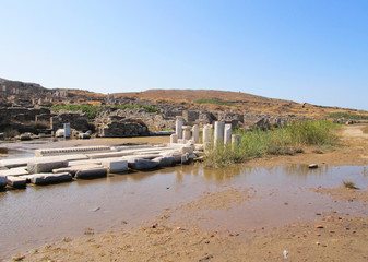 Fototapeta premium Ruins of a white temple in Delos island, Cyclades archipelago, Greece.
