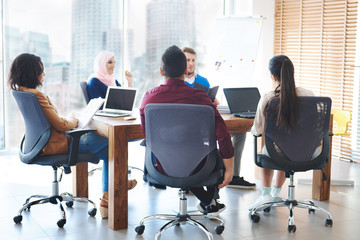 Office workers talking on the meeting