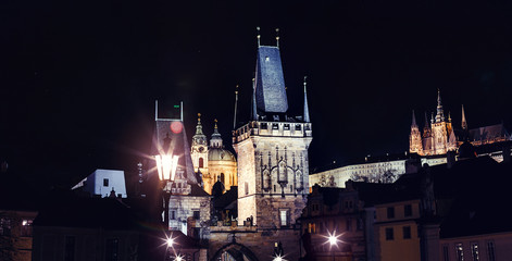 Fototapeta na wymiar Night view from Charles Bridge in Prague to the Old town