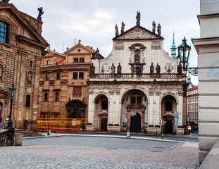 Fototapeta premium Empty Krzhizhovnitskaya square and the church of St. Salvator at early morning
